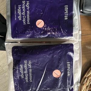 NOT FOR SALE

Pair of Empetua High Waisted Capri Leggings size Large NWT